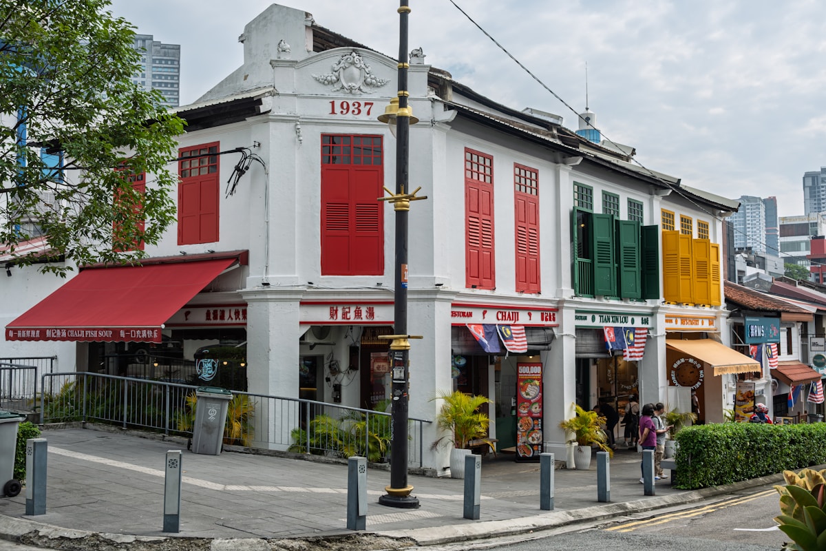 Ipoh old town colonial street with heritage shophouses and street art murals