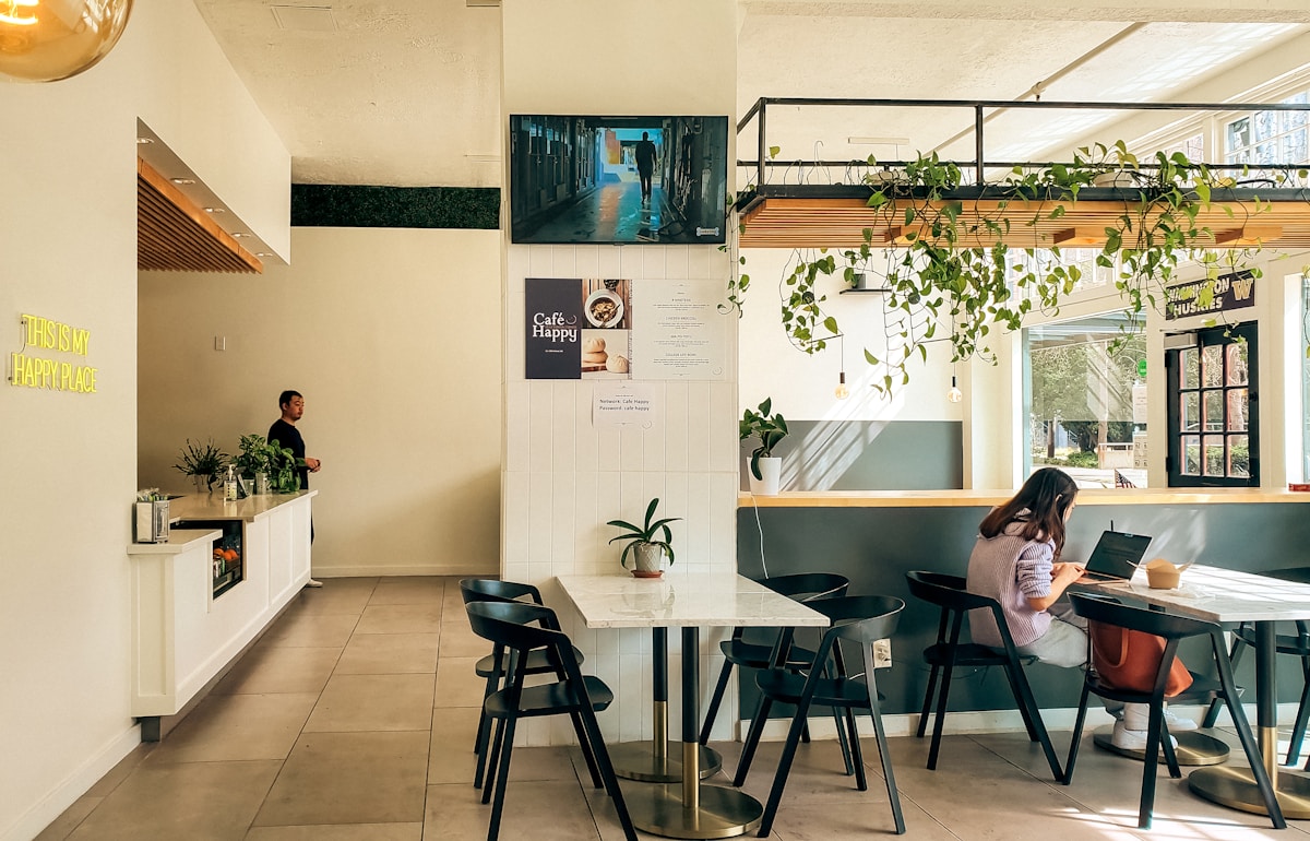Cafe interior with tables and window, Georgetown, Penang